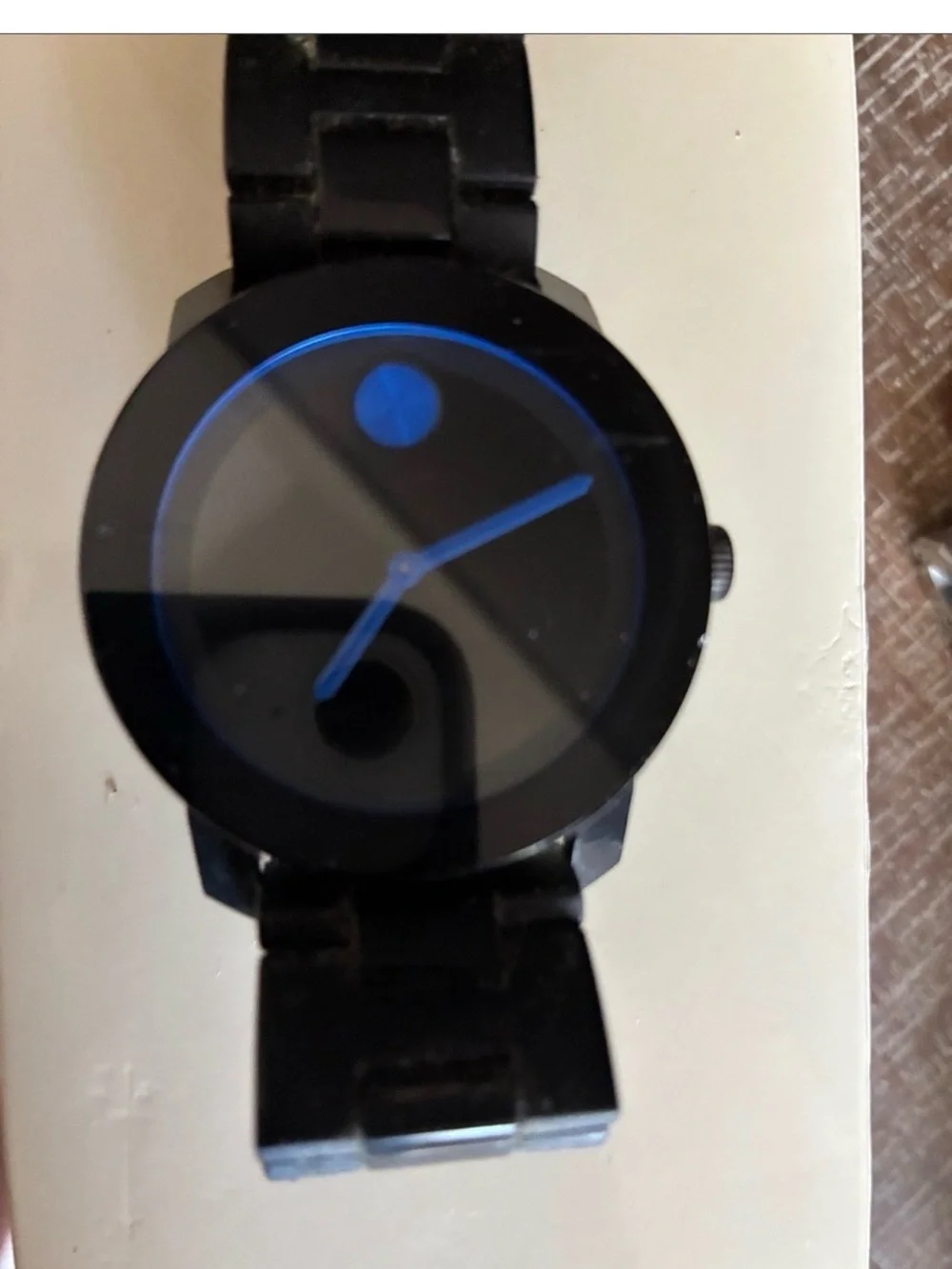 Movado Black Watch with Blue Accents